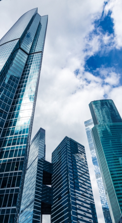 Team collaborating over charts and documents in a meeting room
